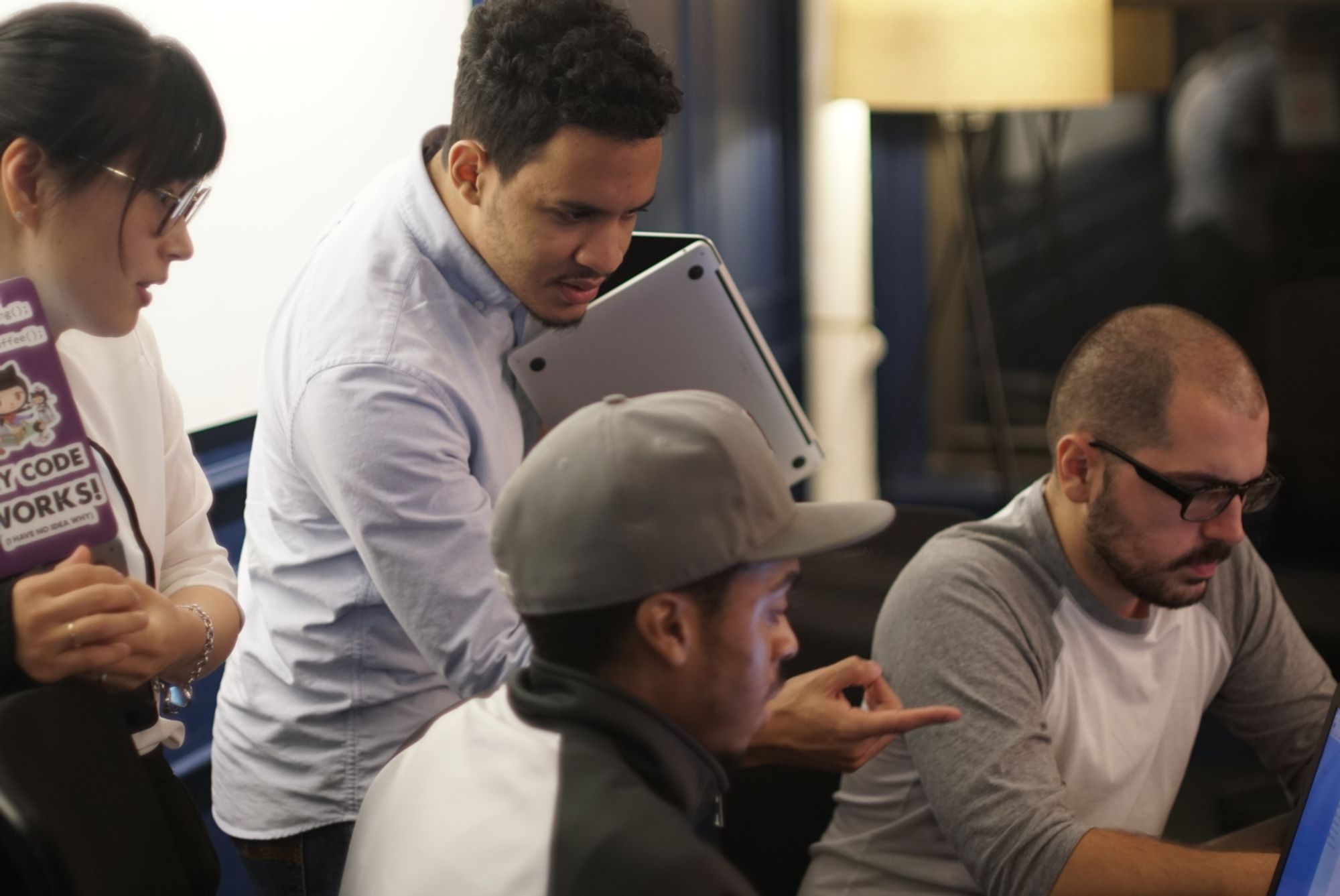 Students learning from software engineers