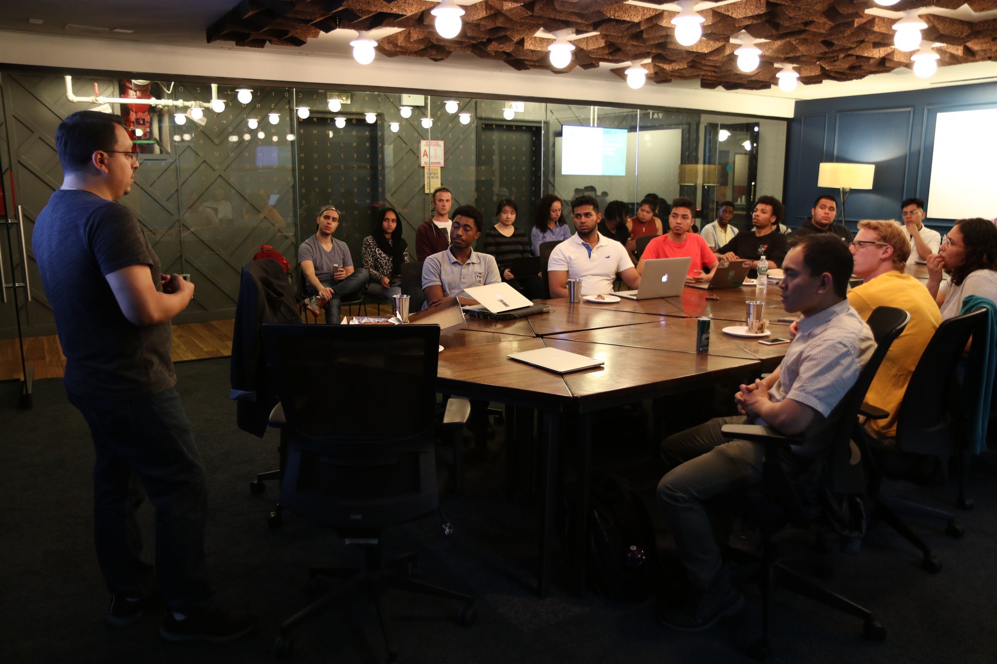 Students learning from software engineers